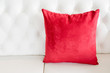 © eriyalim - red pillow on white leather sofa