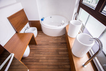 Wooden parquet in contemporary restroom