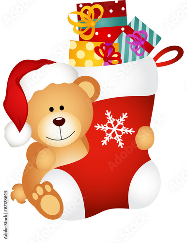 Teddy bear holding Christmas stocking with gifts - Buy this stock ...