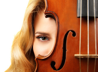 Wall Mural - Young beautiful woman with violin against white background, close up