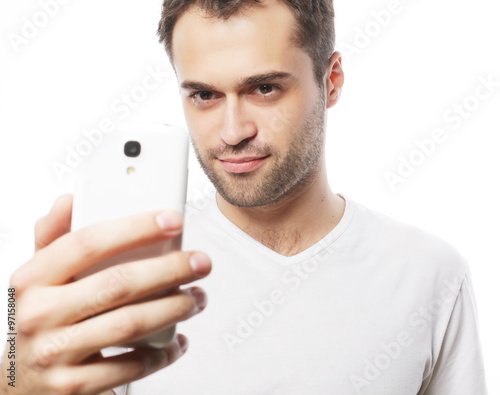 young man making photo of himself Stock Photo | Adobe Stock