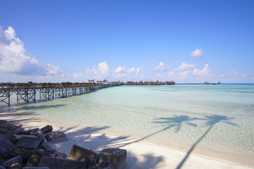 Sticker - beautiful floating chalet at mabul island aand blue sky