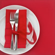 Knife and Fork with red table setting 