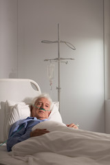 Wall Mural - Elder patient on a drip