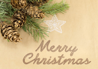 Wall Mural - Merry Christmas card with decorated pine cones