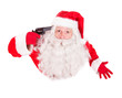 © milkovasa - Santa Claus pointing a gun to his head and looking up to camera