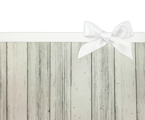 Wall Mural - white ribbon on wooden card 