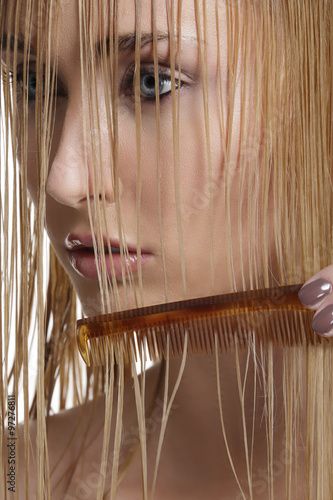 Naklejka na szybę beautiful model comb wet hair after washing