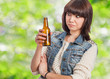 © asierromero - portrait of a pretty young woman drinking a beer
