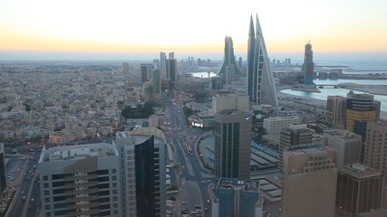 Fototapete - Aerial view of Manama City at dusk, Kinbdom of Bahrain, Middle East
