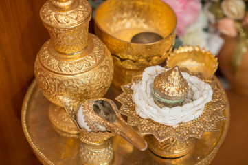 Wall Mural - Conch shell for bless water in Thai wedding ceremony