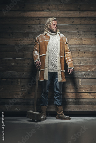 Lumberjack Winter Fashion Man Long Blonde Hair And Beard Holdin