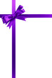 Purple gift ribbon bow vertical corner border frame isolated on white background for christmas or birthday present photo