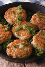 Delicious Fish Cakes With Dill Closeup In A Pan. Vertical