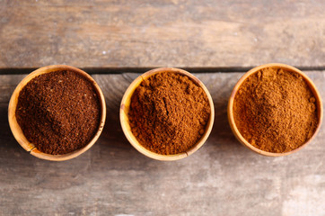 Sticker - Collection of coffee on old wooden table, close up