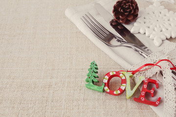 Wall Mural - Christmas table place setting, holidays copy space background, selective focus vintage tone