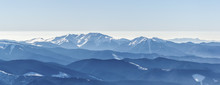 Distant Sharp Peaks. Blue Mountain Ranges. Ukrainian Carpathian Mountains
