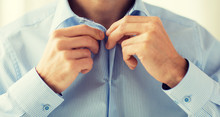 Close Up Of Man In Shirt Dressing 