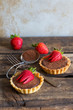 Chocolate tarts and strawberries
