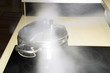 Pressure cooker releasing hot steam