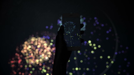 Aufkleber - Silhouette of hand recording fireworks with smartphone
