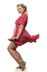 Girl in a red polka dot dress