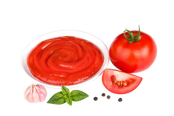 tomato sauce and basil isolated on white background