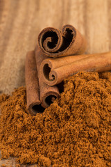 Wall Mural - Cinnamon sticks with powder