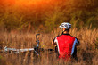 © Aleksey - Mountain Bike cyclist resting outdoor with his bike