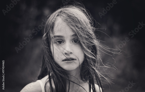 Head shot of girl with windswept hair Stock Photo | Adobe Stock