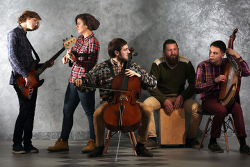 Wall Mural - Musical band on grey wall background