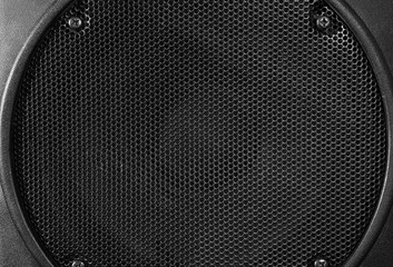 Big loudspeaker on black background, close up