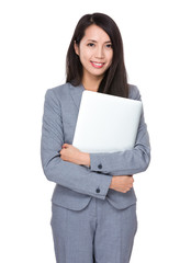 Wall Mural - Young Businesswoman hold with laptop computer