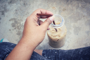 Canvas Print - Selfie of hand with iced coffee