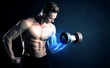 © ra2 studio - Fit athlete lifting weight with blue muscle light concept