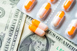 © Sean K - Image of medical expense, with medical tablets and money
