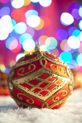 Sticker - Ornament Christmas bauble on colored light background