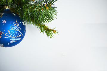 Christmas decorations blue glass ball on Christmas tree background