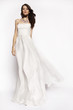 © EVGENY FREEONE - Brunette in white dress posing