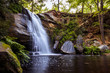 Beautiful Waterfall. Serene Tranquil Landscape with Picturesque Copy Space.
