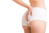 Fototapeta Panele - Woman Examining Her Buttocks for Cellulite