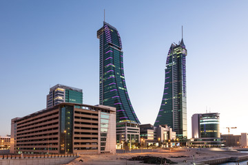 Fototapete - Bahrain Financial Harbour Towers at dusk