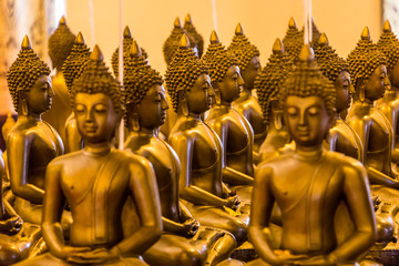 gold statue of buddha