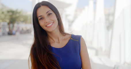 Wall Mural - Pretty friendly young brunette woman