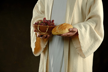 Wall Mural - Jesus Holding bresd and grapes