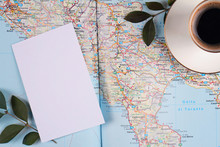 Map Of Italy Cup Of Espresso Coffee And Blank Paper. Traveling And Tourism Background. Planning Holiday Or Vacation Concept