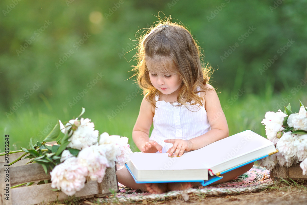 portrait of little girl outdoors in summer Stock Photo | Adobe Stock