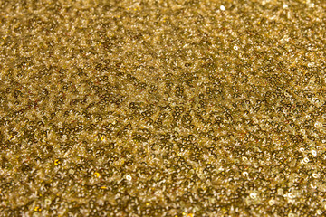 Gold fabric texture with sequins