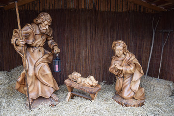 Joseph and Mary with baby Jesus statues at Christmas market