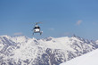 © Vasily Merkushev - White rescue helicopter  in the mountains